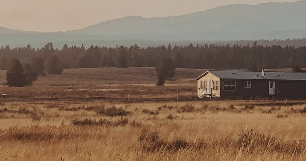 Rural home on prairie at golden hour
